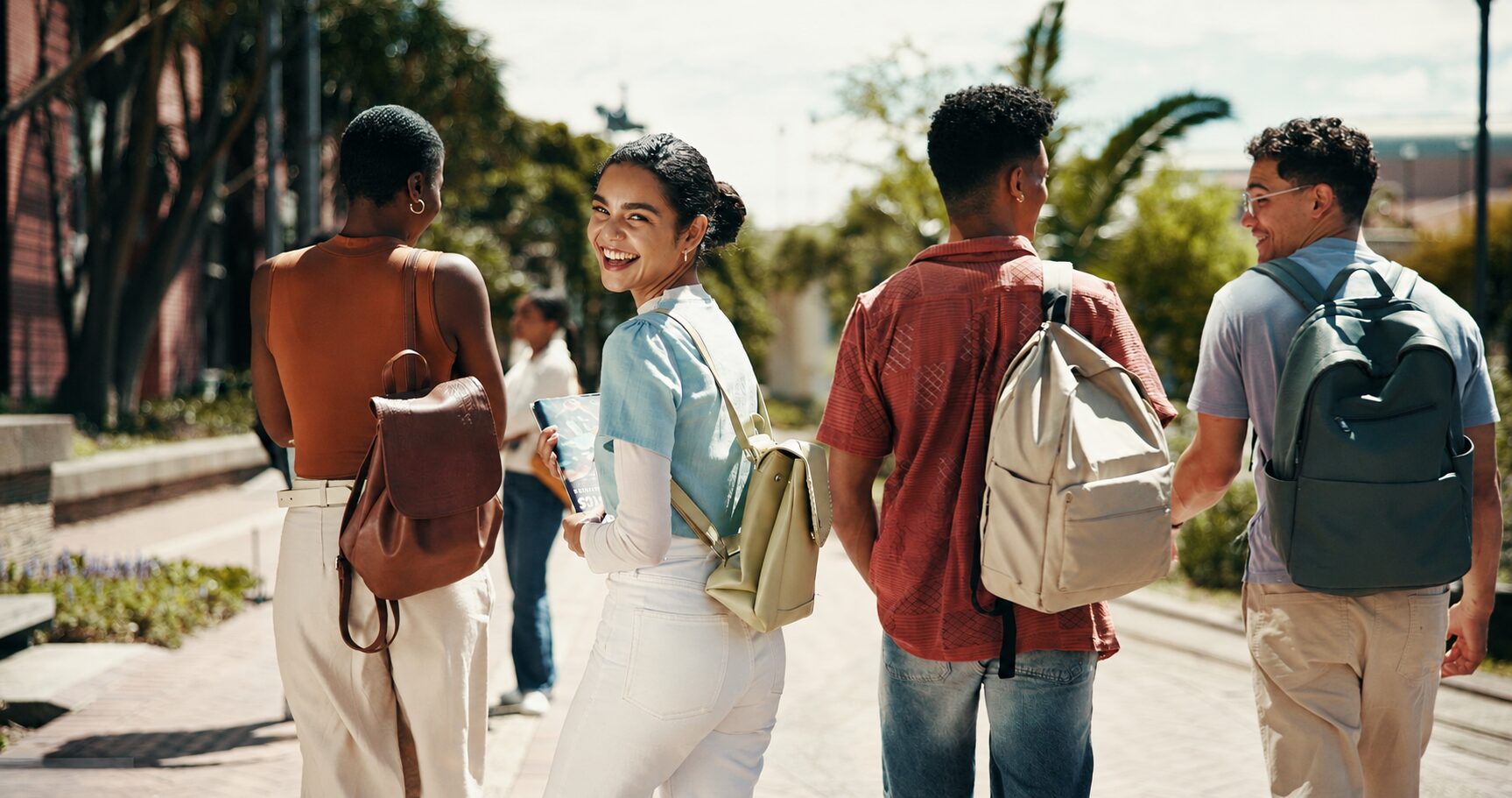 Students with backpacks wide